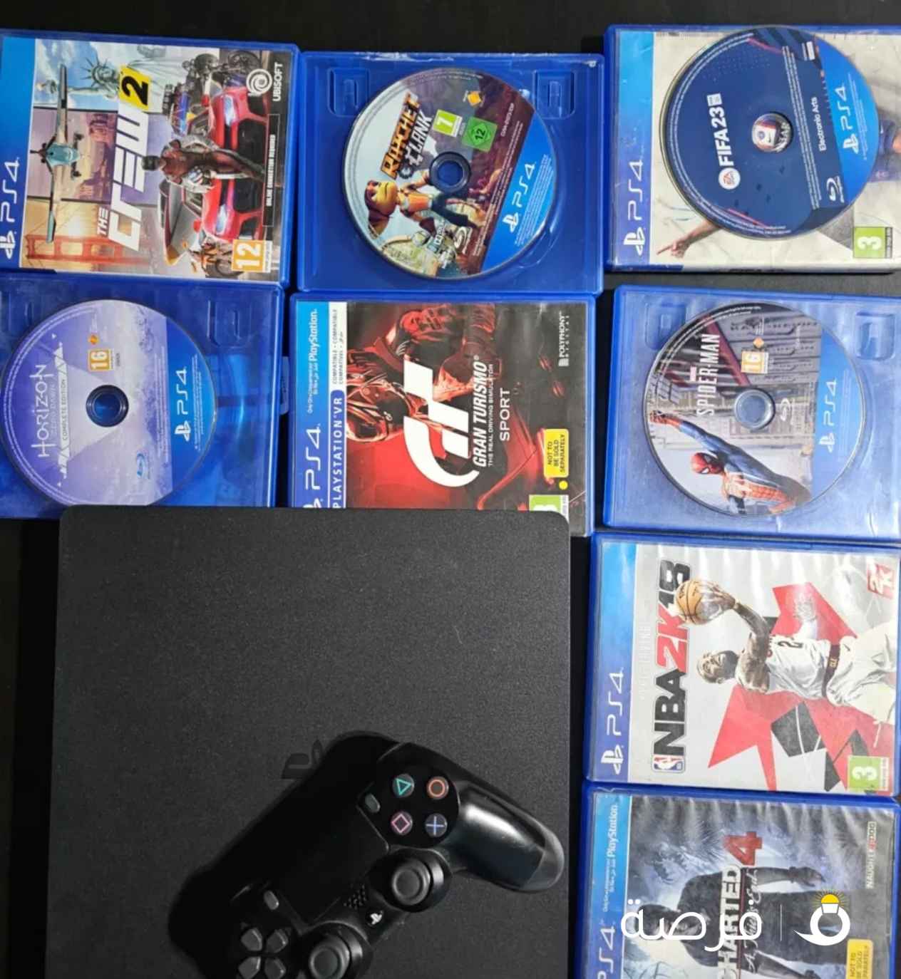 PS4 SLIM 500GB + 8CD GAMES (price slightly negotiable)
