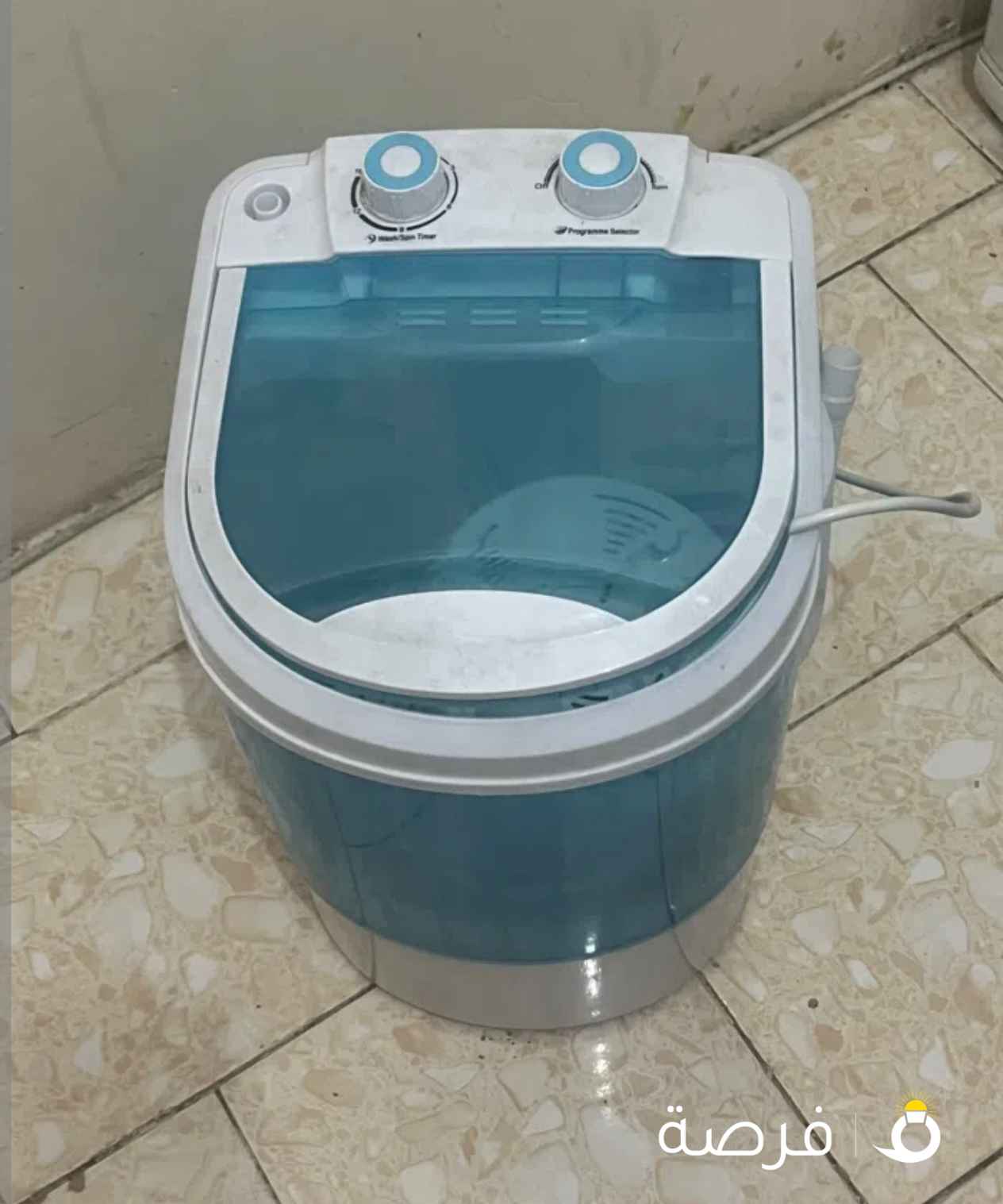 غسالة ومجفف ملابس صغيرة جديدة لم يستخدم سواء مره واحده فقط