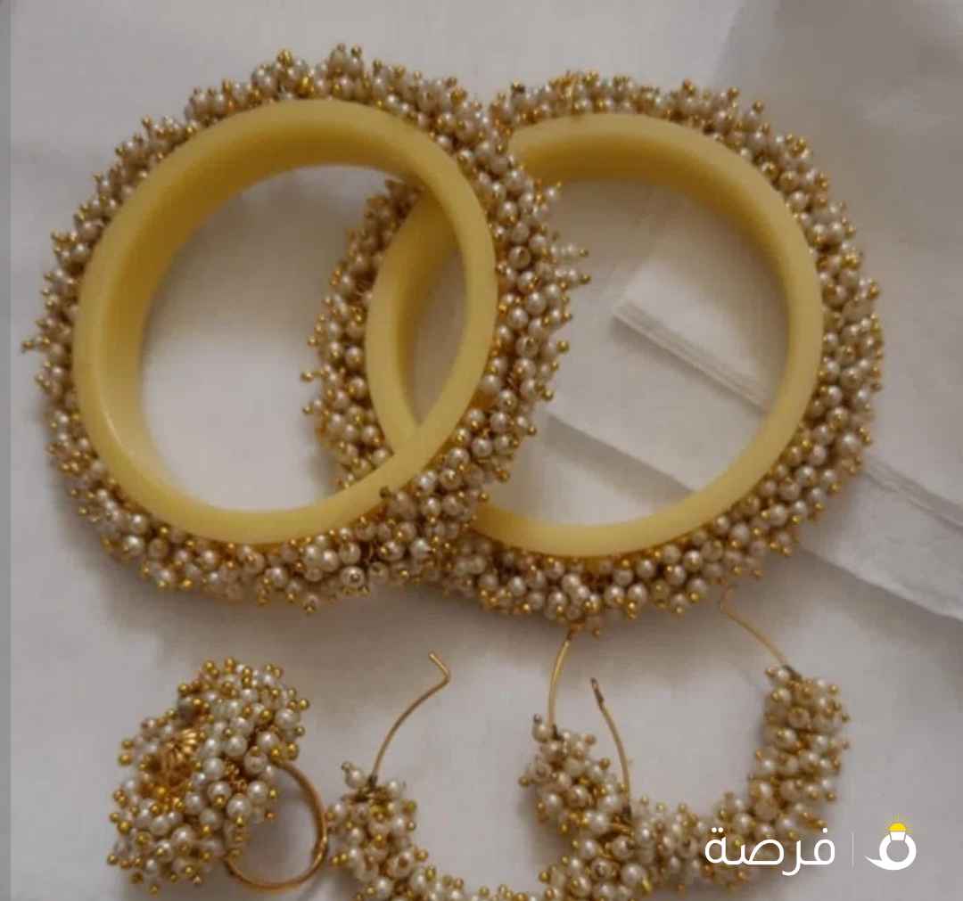 هدايا العيد،طقم أكسسوار أسورتين من العاج المطعم بفصوص لولو مع طراشي شغل يدوي نفس اللؤلؤ